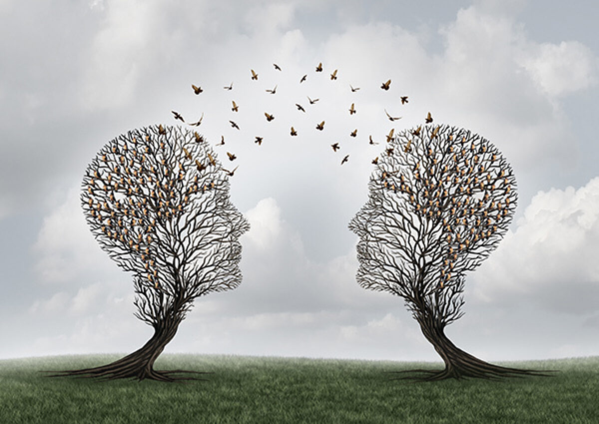 Surreal artwork depicting two trees shaped like human head profiles facing each other. Birds emerge from and fly in an arc between the heads, symbolising communication, the sharing of ideas, knowledge transfer, or empathy.